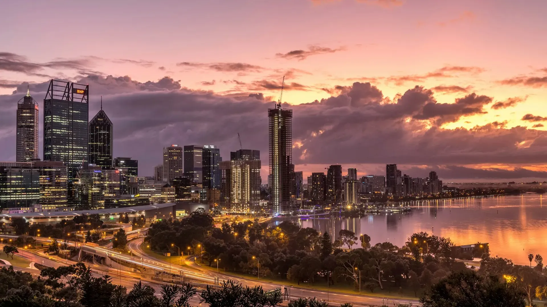 Perth city skyline across the Swan River at dusk